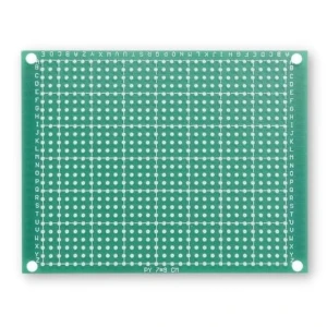 Single-sided prototype PCB board 7×9 cm, 744 holes, 2.54 mm pitch.